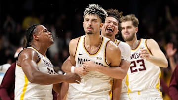 Minnesota Golden Gophers forward Dawson Garcia (3) celebrates his game winning three-point basket 
