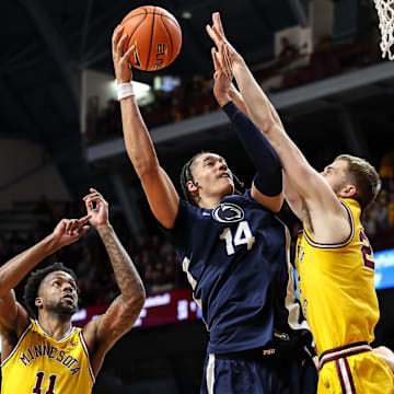 Penn State Nittany Lions forward Yanic Konan Niederhauser goes up for a shot against the Minnesota Golden Gophers in Big Ten action. 