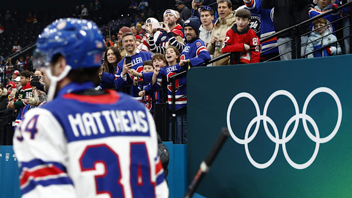 [US, Mexico & Canada customers only] Feb 20, 2026; Milan, Italy; Auston Matthews of United States with fans before the match against Slovakia in a men's ice hockey semifinal during the Milano Cortina 2026 Olympic Winter Games at Milano Santagiulia Ice Hockey Arena. Mandatory Credit: Alessandro Garofalo/Reuters via Imagn Images