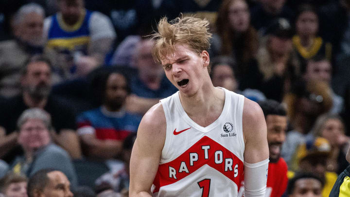 Feb 26, 2024; Indianapolis, Indiana, USA; Toronto Raptors guard Gradey Dick (1) celebrates a basket in the second half against the Indiana Pacers at Gainbridge Fieldhouse. Mandatory Credit: Trevor Ruszkowski-USA TODAY Sports