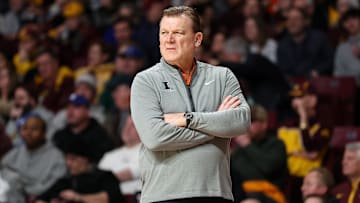 Feb 8, 2025; Minneapolis, Minnesota, USA; Illinois Fighting Illini head coach Brad Underwood looks on during the first half against the Minnesota Golden Gophers at Williams Arena. Mandatory Credit: Matt Krohn-Imagn Images