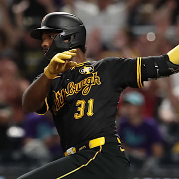 Jul 26, 2025; Pittsburgh, Pennsylvania, USA;  Pittsburgh Pirates second baseman Liover Peguero (31) hits a single against the Arizona Diamondbacks during the seventh inning at PNC Park. Mandatory Credit: Charles LeClaire-Imagn Images