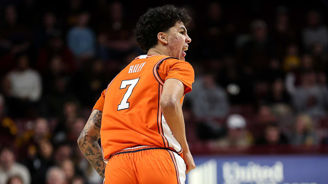 Feb 8, 2025; Minneapolis, Minnesota, USA; Illinois Fighting Illini forward Will Riley (7) celebrates his 3-point basket against the Minnesota Golden Gophers during the second half at Williams Arena. Mandatory Credit: Matt Krohn-Imagn Images