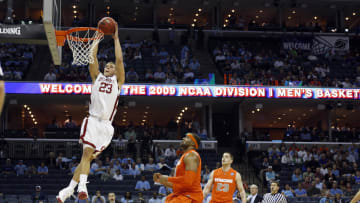 Oklahoma Sooners forward Blake Griffin (23) shoots as Syracuse Orange forward Arinze Onuaku (21) and Eric Devendorf (23) defend in the Sooners 84-71 victory against the Orange in the semifinals of the south region of the 2009 NCAA basketball tournament. Mandatory Credit: Bob Donnan-USA TODAY Sports