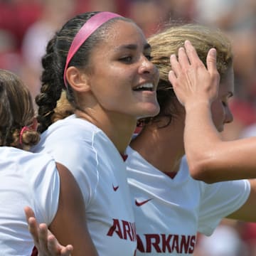 Arkansas soccer celebrates a goal in a 8-0 win over Western Kentucky at Razorback Field 