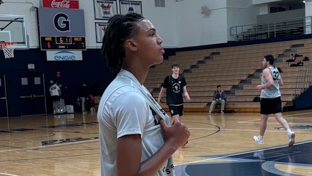 Jordan Scott reflects for moment on the court at Georgetown University during practice for the Capital Classic.