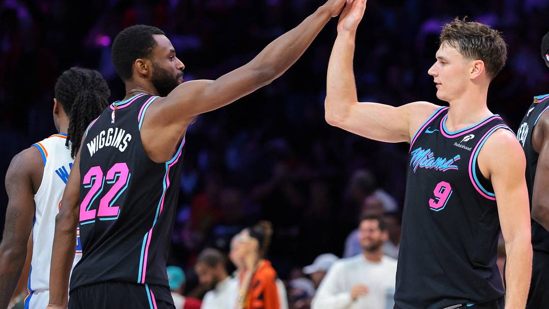 Jan 17, 2026; Miami, Florida, USA; Miami Heat guard Pelle Larsson (9) celebrates with forward Andrew Wiggins (22) against the Oklahoma City Thunder during the fourth quarter at Kaseya Center. Mandatory Credit: Sam Navarro-Imagn Images Jan 17, 2026; Miami, Florida, USA; Miami Heat guard Pelle Larsson (9) celebrates with forward Andrew Wiggins (22) against the Oklahoma City Thunder during the fourth quarter at Kaseya Center. Mandatory Credit: Sam Navarro-Imagn Images
