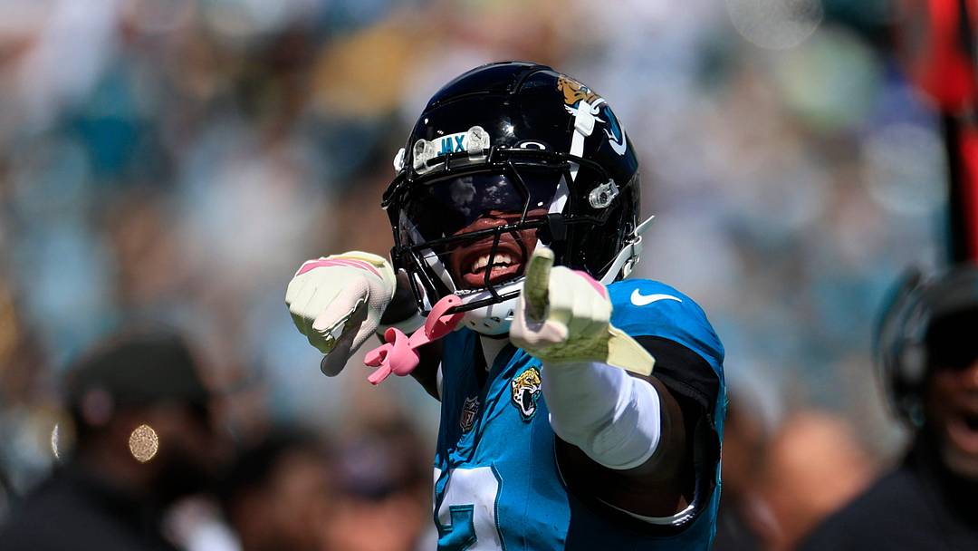 Jacksonville Jaguars wide receiver Travis Hunter (12) reacts to his carry during the first quarter of an NFL football matchup, Sunday, Oct. 12, 2025, at EverBank Stadium in Jacksonville, Fla.