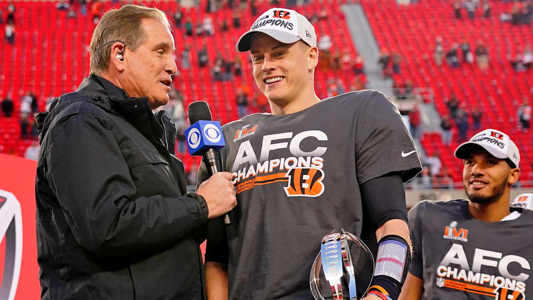 Jan 30, 2022; Kansas City, Missouri, USA; Cincinnati Bengals quarterback Joe Burrow (9) smiles while being interviewed by CBS personality Jim Nantz after winning the AFC Championship Game against the Kansas City Chiefs at GEHA Field at Arrowhead Stadium. The Cincinnati Bengals won 27-24. Mandatory Credit: Jay Biggerstaff-Imagn Images