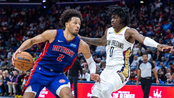 Nov 2, 2023; New Orleans, Louisiana, USA; Detroit Pistons guard Cade Cunningham (2) drives to the basket against New Orleans Pelicans guard Dereon Seabron (0) during the second half at the Smoothie King Center. Mandatory Credit: Stephen Lew-USA TODAY Sports