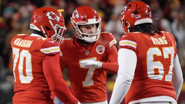 Jan 29, 2023; Kansas City, Missouri, USA; Kansas City Chiefs place kicker Harrison Butker (7) celebrates with offensive tackle Prince Tega Wanogho (70) and offensive tackle Lucas Niang (67) against the Cincinnati Bengals after kicking a field goal during the AFC Championship game at GEHA Field at Arrowhead Stadium. Mandatory Credit: Denny Medley-USA TODAY Sports