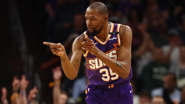 Mar 24, 2025; Phoenix, Arizona, USA; Phoenix Suns forward Kevin Durant (35) reacts against the Milwaukee Bucks at Footprint Center. Mandatory Credit: Mark J. Rebilas-Imagn Images