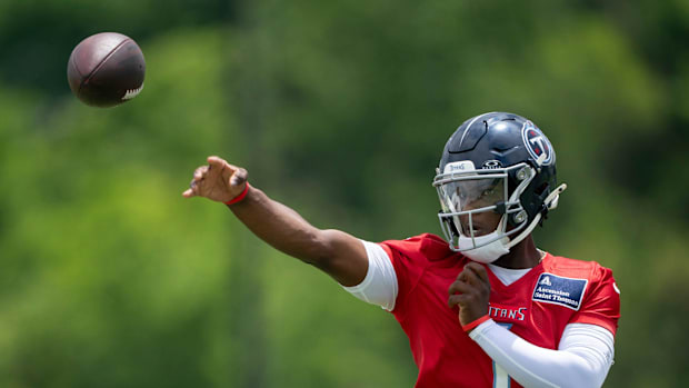 Tennessee Titans quarterback Cam Ward (1) throws in drills during OTAs at Ascension Saint Thomas Sports Park in Nashville