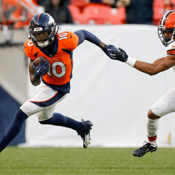 Nov 26, 2023; Denver, Colorado, USA; Denver Broncos wide receiver Jerry Jeudy (10) runs the ball against Cleveland Browns cornerback Greg Newsome II (0) in the third quarter at Empower Field at Mile High. Mandatory Credit: Isaiah J. Downing-USA TODAY Sports