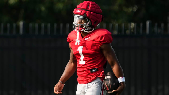 Aug 8, 2024; Columbus, Ohio, USA; Ohio State Buckeyes running back Quinshon Judkins (1) carries the ball during football practice at the Woody Hayes Athletic Complex.