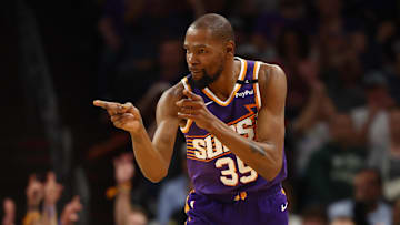Mar 24, 2025; Phoenix, Arizona, USA; Phoenix Suns forward Kevin Durant (35) reacts against the Milwaukee Bucks at Footprint Center. Mandatory Credit: Mark J. Rebilas-Imagn Images