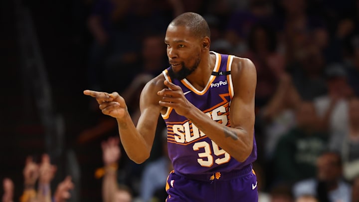 Mar 24, 2025; Phoenix, Arizona, USA; Phoenix Suns forward Kevin Durant (35) reacts against the Milwaukee Bucks at Footprint Center. Mandatory Credit: Mark J. Rebilas-Imagn Images