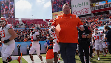 Jan 2, 2023; Tampa, FL, USA; Illinois Fighting Illini head coach Bret Bielema takes the field fro the  the 2023 ReliaQuest Bowl against the Mississippi State Bulldogs  at Raymond James Stadium. Mandatory Credit: Nathan Ray Seebeck-Imagn Images