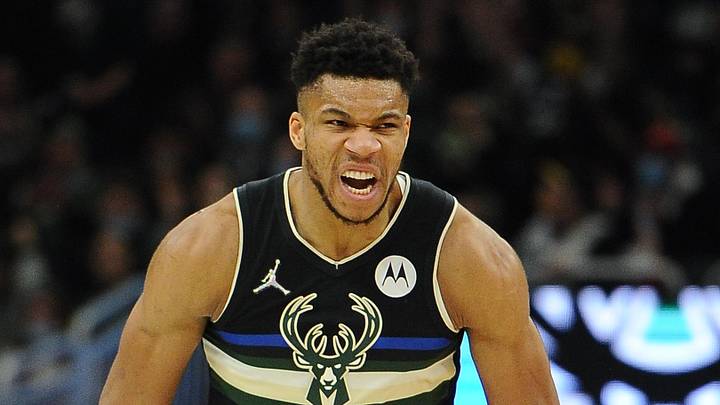 Milwaukee Bucks forward Giannis Antetokounmpo (34) celebrates after making a three-point shot in the second half against the New York Knicks at Fiserv Forum on January 28, 2022.