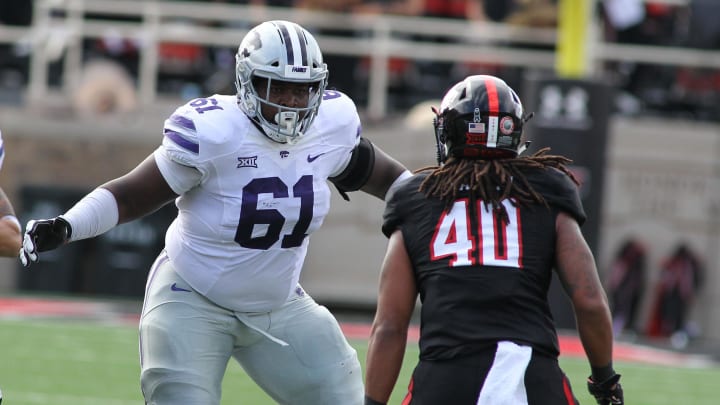 Nov 4, 2017; Lubbock, TX, USA; Kansas State Wildcats left guard Abdul Beecham (61) prepares to block Texas Tech Red Raiders defensive back Dakota Allen (40) at Jones AT&T Stadium. Mandatory Credit: Michael C. Johnson-USA TODAY Sports