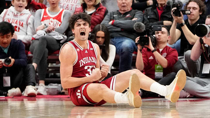 Feb 6, 2024; Columbus, Ohio, USA; Indiana Hoosiers guard Trey Galloway (32) reacts after drawing a foul during the second half of the men   s basketball game against the Ohio State Buckeyes at Value City Arena. Ohio State lost 76-73.