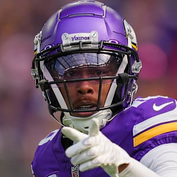 Sep 15, 2024; Minneapolis, Minnesota, USA; Minnesota Vikings wide receiver Justin Jefferson (18) signals the referee against the San Francisco 49ers in the first quarter at U.S. Bank Stadium.