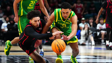 San Diego State Aztecs guard Miles Byrd (21) and Oregon Ducks guard Jadrian Tracey