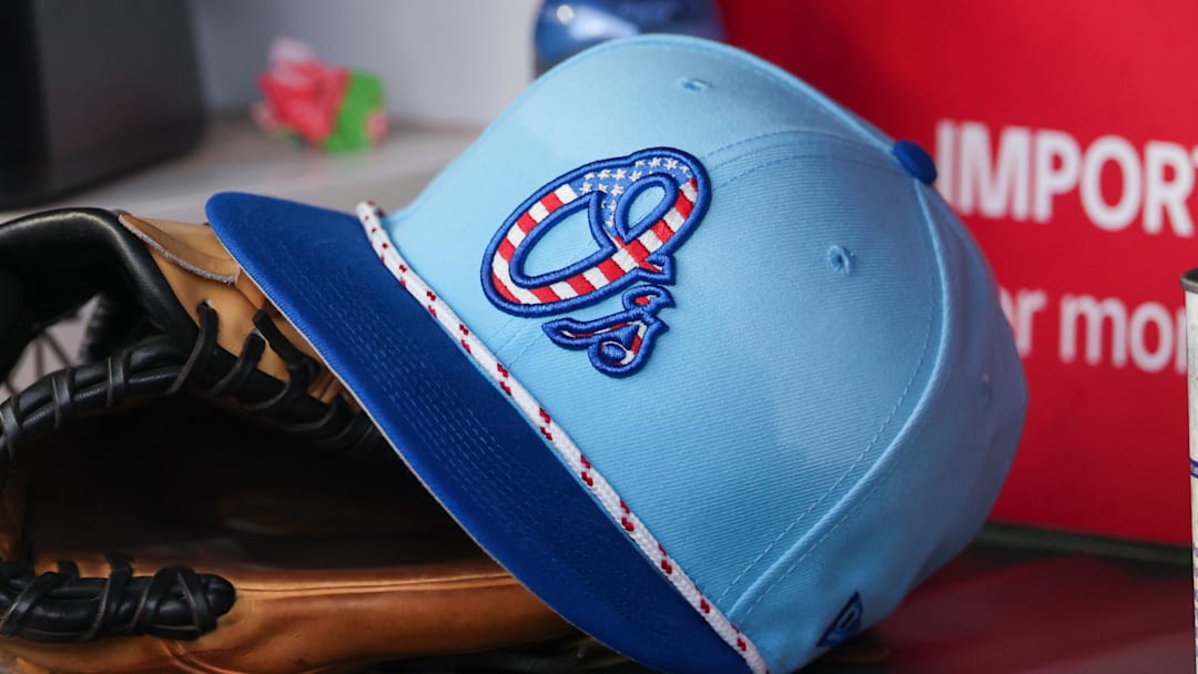 Jul 4, 2025; Atlanta, Georgia, USA; A detailed view of the Baltimore Orioles 4th of July hat in the dugout against the Atlanta Braves in the third inning at Truist Park. 