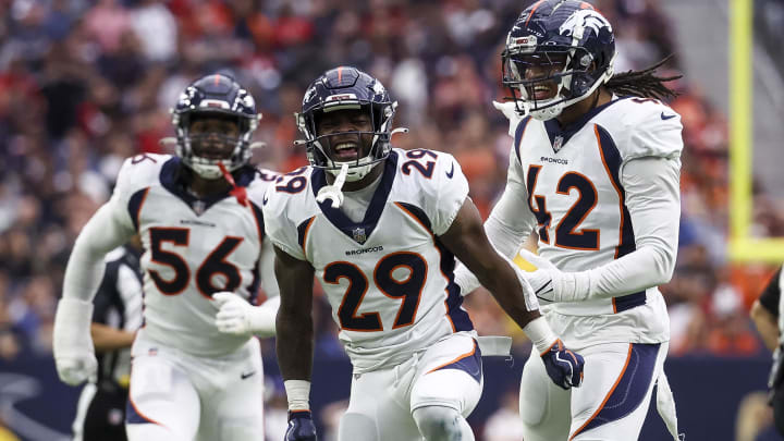 Dec 3, 2023; Houston, Texas, USA; Denver Broncos cornerback Ja'Quan McMillian (29) reacts after making a sack during the third quarter against the Houston Texans at NRG Stadium. 