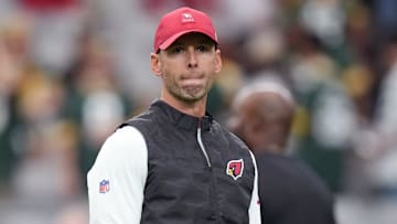 Arizona Cardinals head coach Jonathan Gannon watches as his team warms up before playing against the Green Bay Packers at State Farm Stadium in Glendale on Oct. 19, 2025.