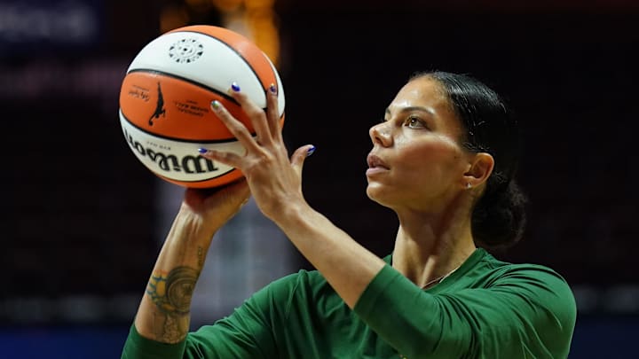 Jul 28, 2025; Uncasville, Connecticut, USA; Seattle Storm forward Alysha Clark (32) warms up before the start of the game against the Connecticut Sun at Mohegan Sun Arena. Mandatory Credit: David Butler II-Imagn Images