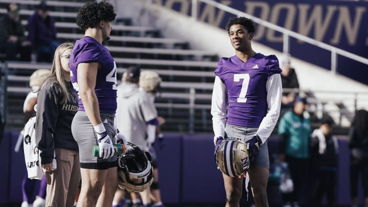 Maurice Heims (45) chats up new teammate Ephesians Prysock (7) during spring ball. 