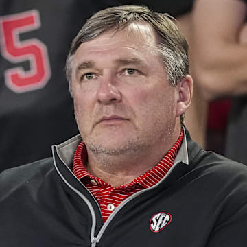 Feb 25, 2025; Athens, Georgia, USA; Georgia Bulldogs head football coach Kirby Smart watches the basketball game between Georgia and the Florida Gators during the second half at Stegeman Coliseum. Mandatory Credit: Dale Zanine-Imagn Images