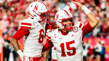 Aug 28, 2025; Kansas City, Missouri, USA; Nebraska Cornhuskers quarterback Dylan Raiola (15) celebrates with wide receiver Dane Key (6) after a touchdown against the Cincinnati Bearcats during the fourth quarter at GEHA Field at Arrowhead Stadium. Mandatory Credit: Dylan Widger-Imagn Images