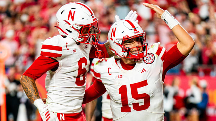 Aug 28, 2025; Kansas City, Missouri, USA; Nebraska Cornhuskers quarterback Dylan Raiola (15) celebrates with wide receiver Dane Key (6) after a touchdown against the Cincinnati Bearcats during the fourth quarter at GEHA Field at Arrowhead Stadium. Mandatory Credit: Dylan Widger-Imagn Images
