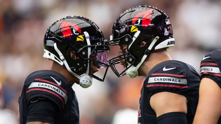 Oct 8, 2023; Glendale, Arizona, USA; Arizona Cardinals tight end Zach Ertz (right) celebrates a touchdown with quarterback Joshua Dobbs against the Cincinnati Bengals in the first half at State Farm Stadium. Mandatory Credit: Mark J. Rebilas-USA TODAY Sports