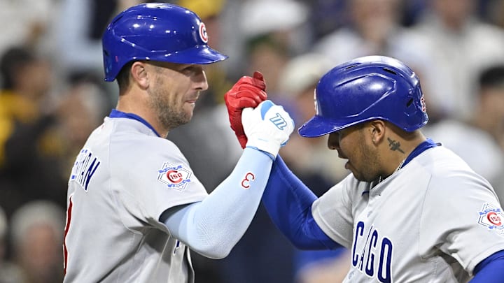 Apr 27, 2026; San Diego, California, USA; Chicago Cubs catcher Moises Ballesteros (25) is congratulated by third baseman Alex Bregman (3) after hitting a grand slam during the third inning against the San Diego Padres at Petco Park. Mandatory Credit: Denis Poroy-Imagn Images
