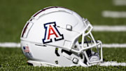 Nov 25, 2022; Tucson, Arizona, USA; Detailed view of an Arizona Wildcats helmet on the field during the Territorial Cup at Arizona Stadium. Mandatory Credit: Mark J. Rebilas-Imagn Images