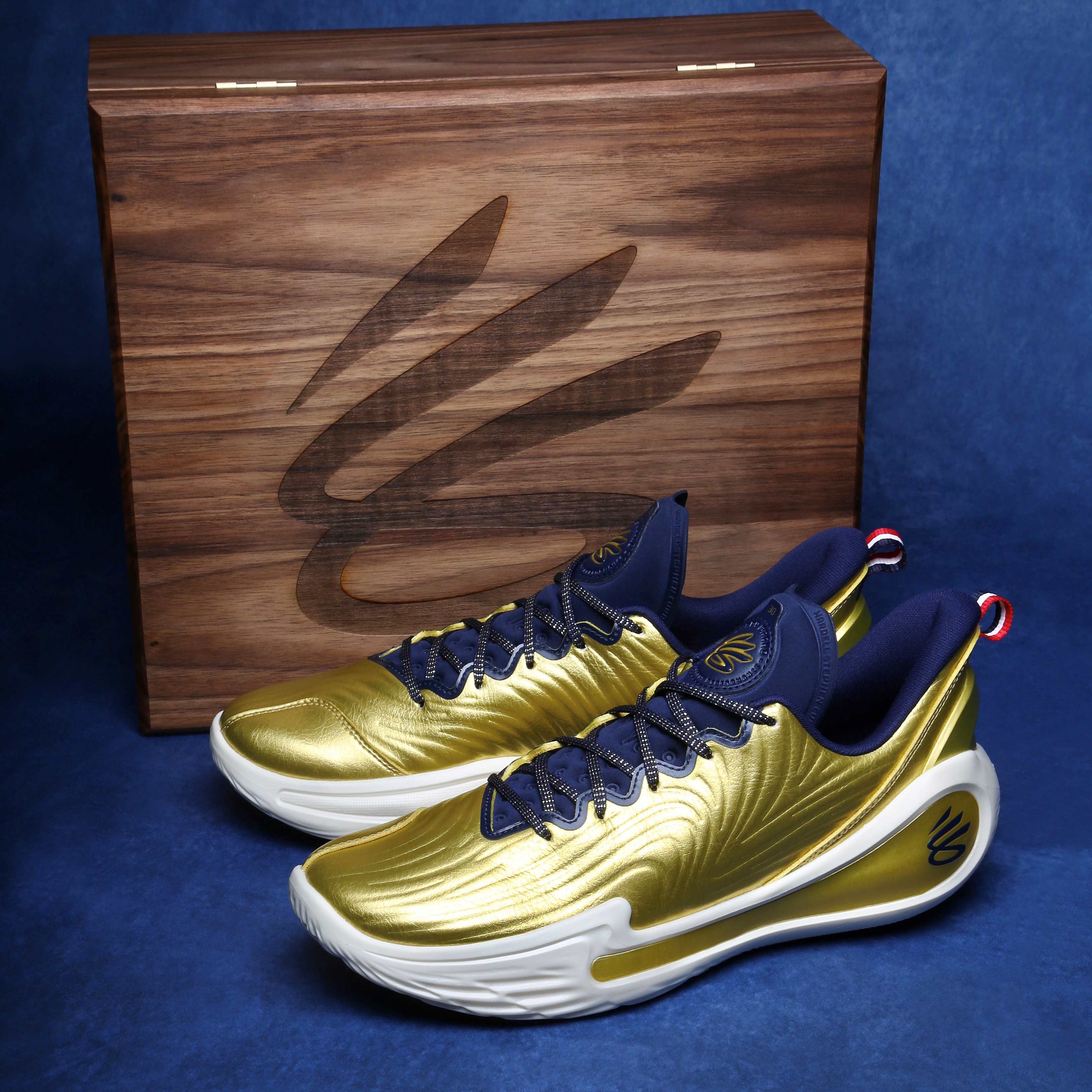 gold and white stephen curry shoes