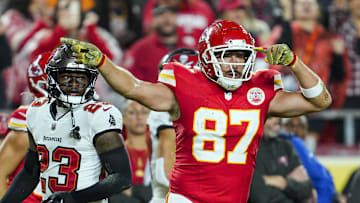 Nov 4, 2024; Kansas City, Missouri, USA; Kansas City Chiefs tight end Travis Kelce (87) celebrates after a first down during the first half against the Tampa Bay Buccaneers at GEHA Field at Arrowhead Stadium. Mandatory Credit: Jay Biggerstaff-Imagn Images