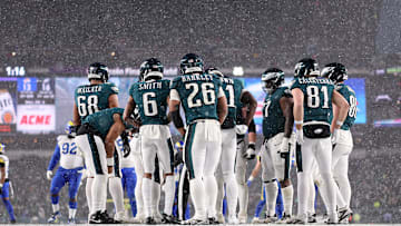 Jan 19, 2025; Philadelphia, Pennsylvania, USA; Philadelphia Eagles running back Saquon Barkley (26) and his team huddle up for a play against the Los Angeles Rams in a 2025 NFC divisional round game at Lincoln Financial Field. Mandatory Credit: Bill Streicher-Imagn Images