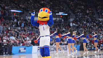 Mar 20, 2025; Providence, RI, USA;  Kansas Jayhawks mascot on the court between play during the first half against the Arkansas Razorbacks at Amica Mutual Pavilion. Mandatory Credit: Gregory Fisher-Imagn Images