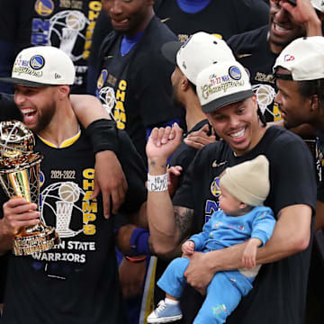 Jun 16, 2022; Boston, Massachusetts, USA; Golden State Warriors guard Jordan Poole (3), guard Stephen Curry (30), and guard Damion Lee (1) celebrate after defeating the Boston Celtics in game six of the 2022 NBA Finals at the TD Garden. Mandatory Credit: Paul Rutherford-Imagn Images