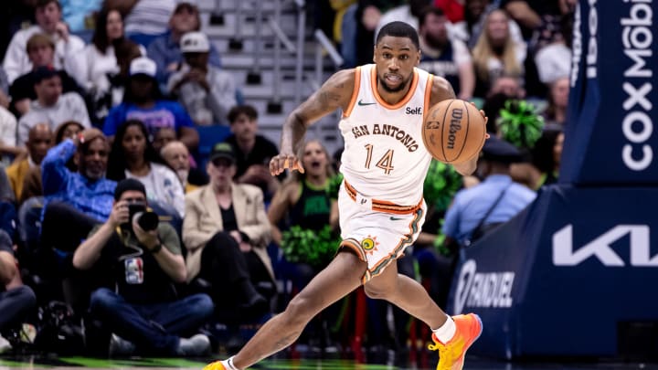 Apr 5, 2024; New Orleans, Louisiana, USA; San Antonio Spurs guard Blake Wesley (14) brings the ball up court against the New Orleans Pelicans during the second half at Smoothie King Center.