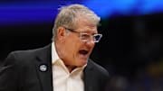 Apr 4, 2025; Tampa, FL, USA;  Connecticut Huskies head coach Geno Auriemma reacts during first quarter in a semifinal of the women's 2025 NCAA tournament against the UCLA Bruins at Amalie Arena. Mandatory Credit: Nathan Ray Seebeck-Imagn Images