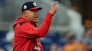 Sep 10, 2025; Miami, Florida, USA; Washington Nationals interim manager Miguel Cairo (22) argues with first base umpire Laz Diaz (not pictured) against the Miami Marlins during the sixth inning at loanDepot Park. Mandatory Credit: Sam Navarro-Imagn Images