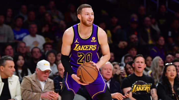 Jan 11, 2024; Los Angeles, California, USA; Los Angeles Lakers guard Dylan Windler (20) controls the ball against the Phoenix Suns during the second half at Crypto.com Arena. Mandatory Credit: Gary A. Vasquez-USA TODAY Sports