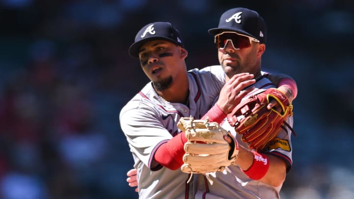 Atlanta Braves shortstop Orlando Arcia and second baseman Whit Merrifield