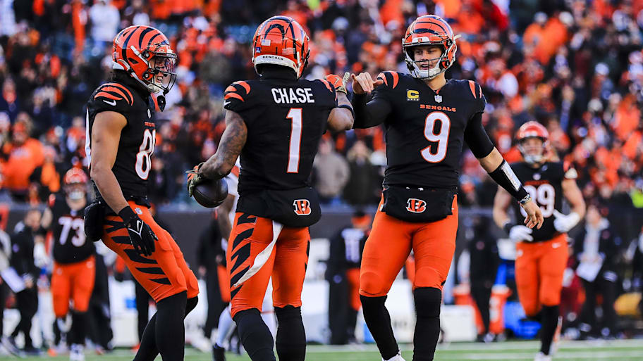 Dec 22, 2024; Cincinnati, Ohio, USA; Cincinnati Bengals wide receiver Ja'Marr Chase (1) reacts with quarterback Joe Burrow (9) after scoring a touchdown in the second half against the Cleveland Browns at Paycor Stadium. Mandatory Credit: Katie Stratman-Imagn Images | Katie Stratman-Imagn Images
