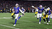 Buffalo Bills quarterback Josh Allen (17) runs into the end zone on this 52 yard run.